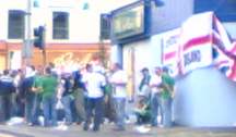 Group of 'fans' outside an off-licence near Windsor Park