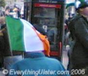 Spectator carrying an Irish tricolour