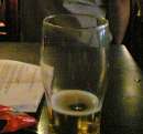 Europe Calling Time on Britain's Pints Almost empty pint glass on a bar table
